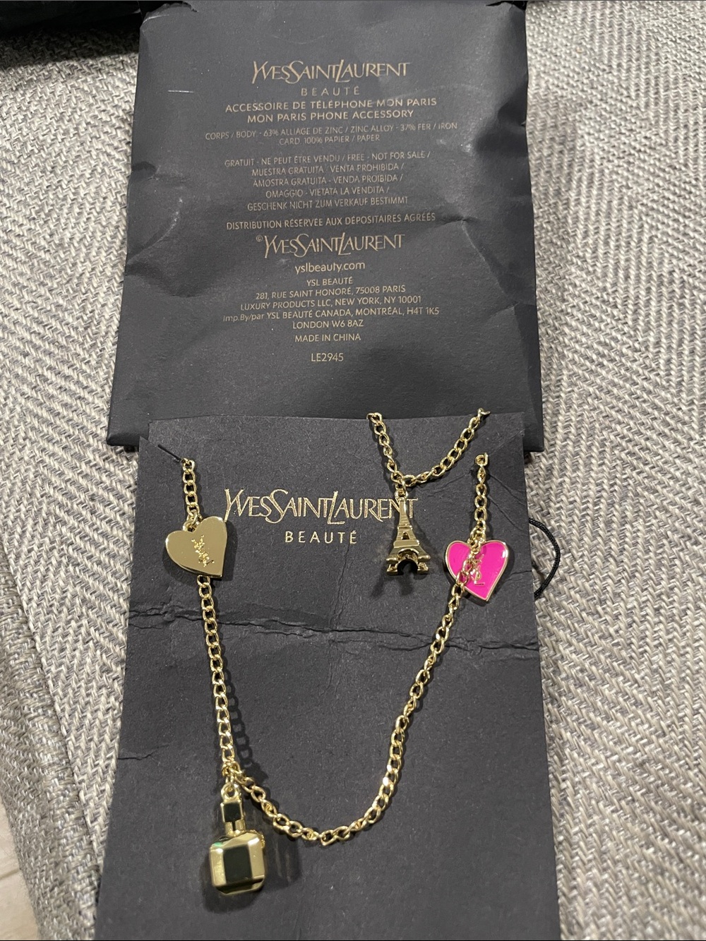 Yves Saint Laurent Gold phone chain with Pink & Gold Heart and Eiffel Charms